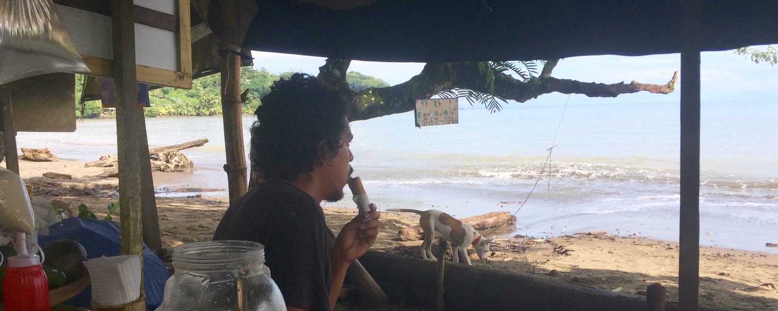 V eating empanada in drake